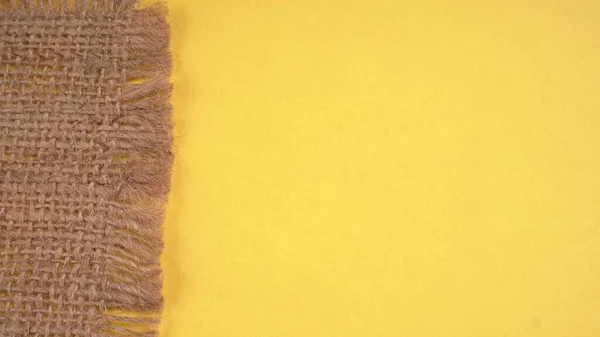 Close Burlap Fabric Napkin Yellow Background — Foto de Stock