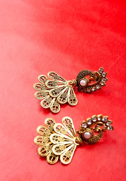 Beautiful Earrings Red Background — Photo
