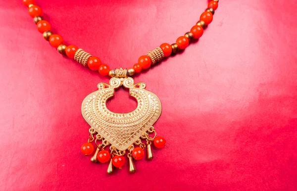 Beautiful Traditional Indian Necklace Heart Form Red Background — Stockfoto