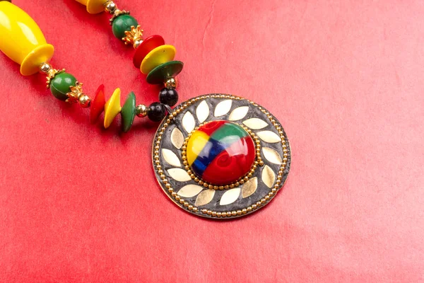 Beautiful Colorful Necklace Red Background — Stockfoto