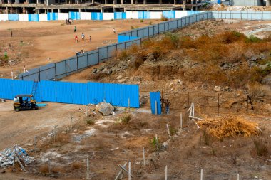 Construction site with fence in India 