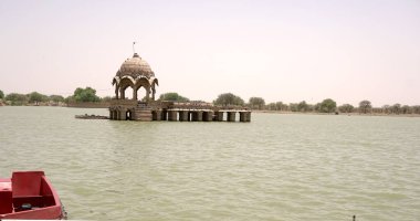 Ancient brick building in river, India