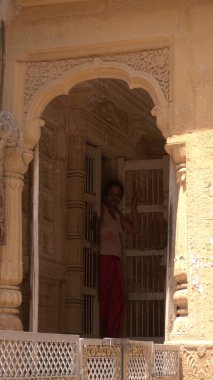 Man in door of his ancient house 