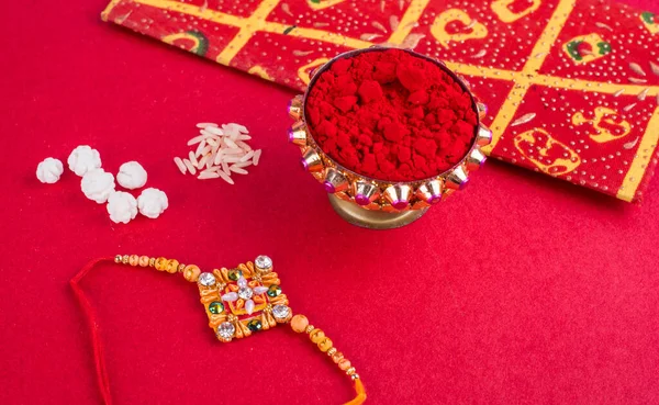 Traditional Indian Jewelry Rice Spice Greeting Card Red Background — Fotografie, imagine de stoc