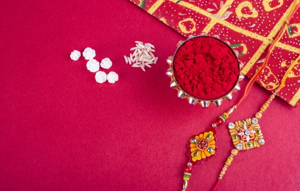 Traditional Indian Jewelry Rice Spice Greeting Card Red Background — Fotografie, imagine de stoc