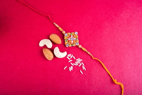 Traditional Indian Jewelry Rice Peanuts Red Background — 스톡 사진