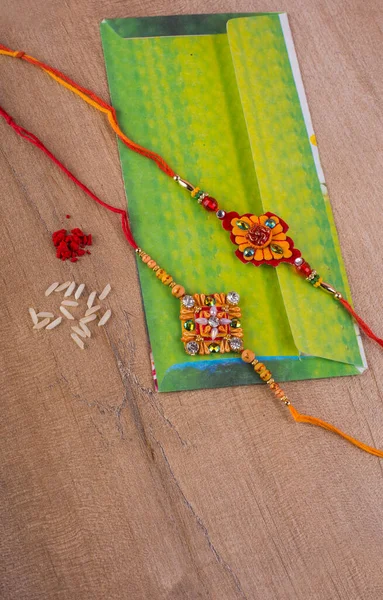 Traditional Indian Jewelry Rice Spice Envelope Wooden Background — Stok Foto