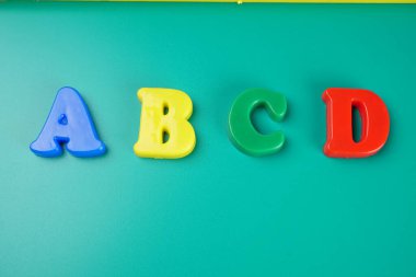 ABCD letters on green background