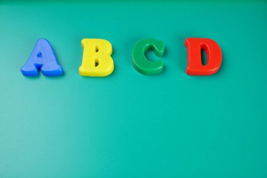 ABCD letters on green background