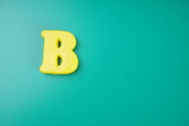 Letter B isolated on green background