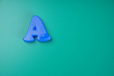 Letter A isolated on green background