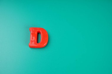 Letter D isolated on green background