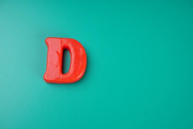 Letter D isolated on green background