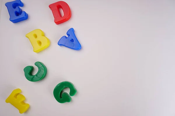Colorful alphabet letters on white background