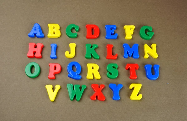 Colorful English Alphabet Brown Background — Foto de Stock