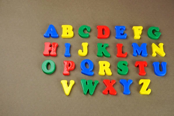 Colorful English Alphabet Brown Background — Foto de Stock