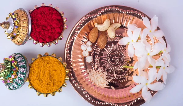 Beautifully Decoration for festival celebration to worship, turmeric powder and kumkum, flowers with leaves
