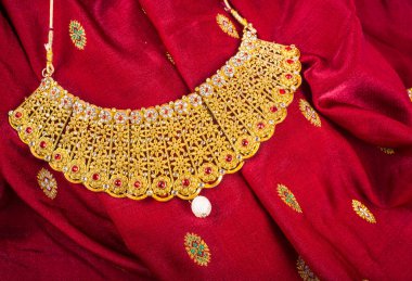 Golden Necklace to wear by a married hindu women, arranged with beautiful backgrond. Indian Traditional Jewellery.