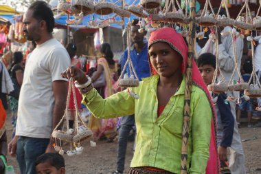 Young Indian woman selling souvenirs