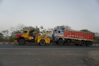 Truck riding road in India