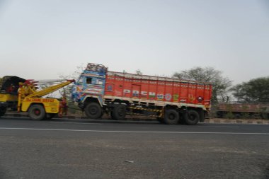 Truck riding road in India