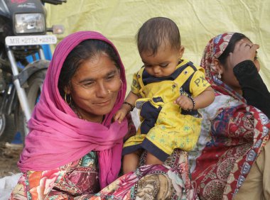 Indian women with baby boy