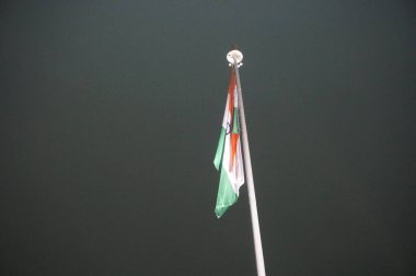 Indian flag on dark sky background 