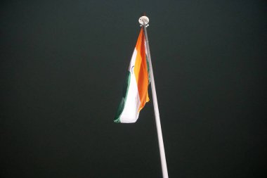 Indian flag on dark sky background 