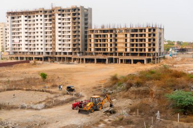 Hindistan 'da inşaat alanında kazıcı