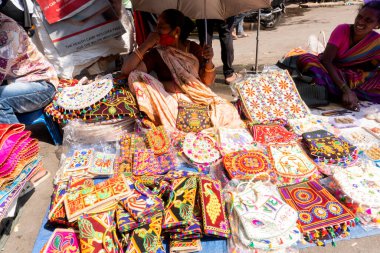 AMRAVATI, MAHARASHTRA, INDIA 04 MARCH 2019: Unidentified vendor selling Traditional various goods to rural people at annual village Fair.
