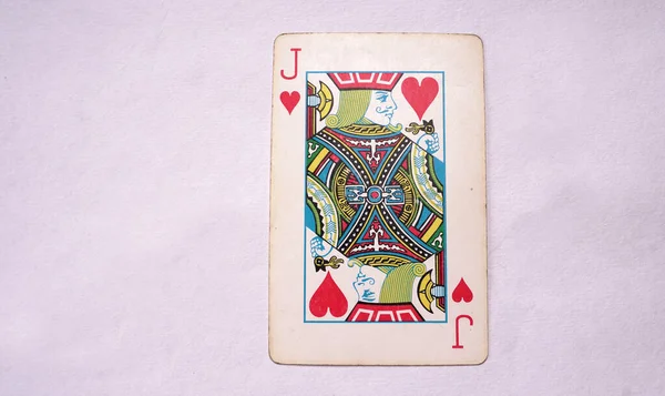 Joker playing card on white background