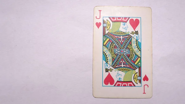 Joker playing card on white background