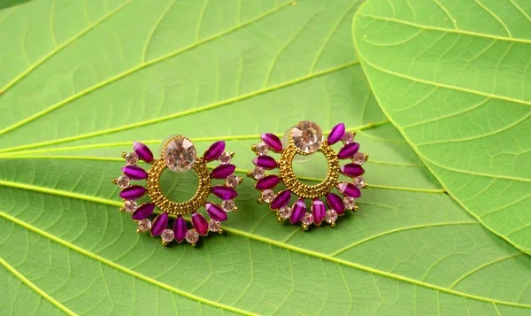 Indian Traditional Antique Retro Style Earrings Green Leaves Textured Background — Stock Photo, Image