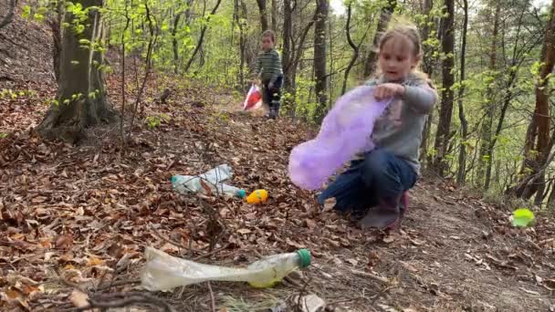 Charming kids preserving environment from pollution outdoors — Stock videók
