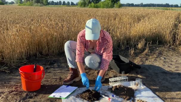 Female Agronomist Rubber Gloves Sampling Soil Taking Sample Test Tube — Wideo stockowe