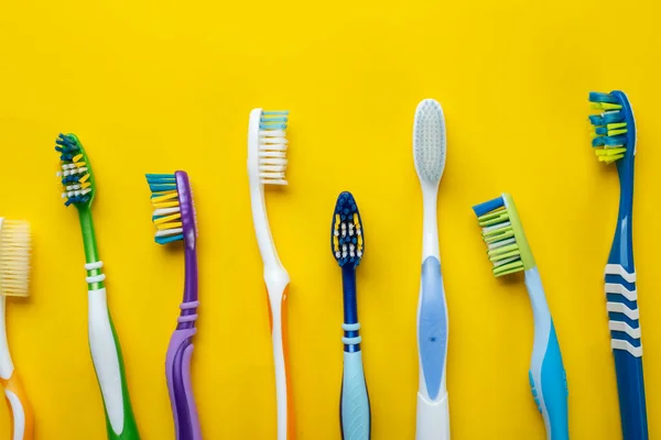 Toothbrushes Yellow Background Hygiene Oral Cavity Top View — Stock Photo, Image