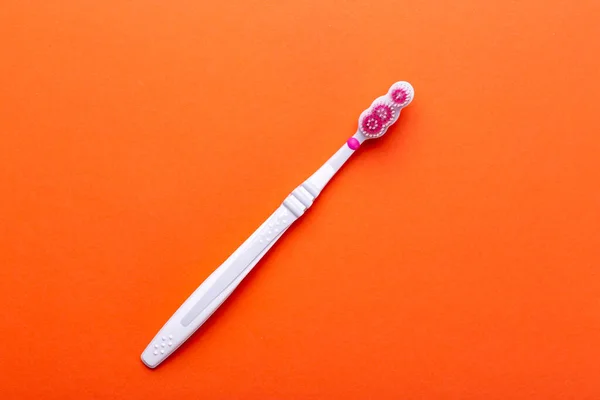 Toothbrushes Orange Background Oral Cavity Care Dental Hygiene Top View — Stock Photo, Image