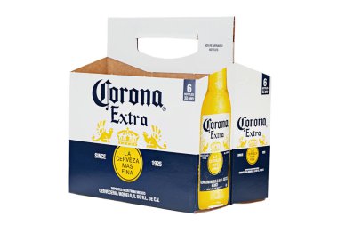 Ukraine, Kyiv - July 12. 2022:  empty cardboard pack of Corona Extra Beer, side front view. Corona is the most popular imported beer in the United States.