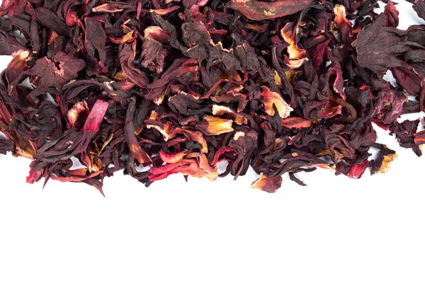 Karkade tea. Bunch of dry hibiscus tea isolated on white background, top view