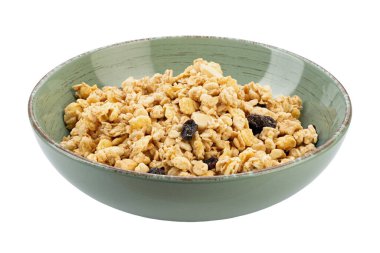 Granola bowl with raisins, nuts. Homemade crunchy granola  isolated on white background. Healthy eating. File contains clipping path. 