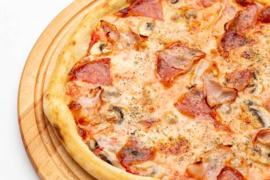 Fresh homemade Italian pizza, fast food cheese, tomato sauce, tomato and other ingredients portion on the table healthy meal snack outdoor. Top view.