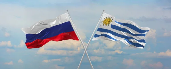 Flags Russia Uruguay Waving Wind Flagpoles Sky Clouds Sunny Day — Stock Photo, Image