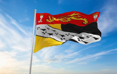 Norfolk ilçesi bayrağı, İngiltere, bulutlu arka planda gün batımında, panoramik manzara. Büyük Britanya Birleşik Krallığı, İngiltere. Geniş afiş afiş için kopyalama alanı, 3d illüstrasyon