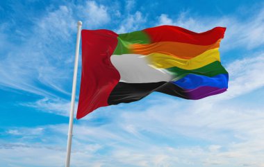 Birleşik Arap Emirlikleri bayrağının ulusal lgbt bayrağı bulutlu gökyüzünde rüzgarda dalgalanıyor. Özgürlük ve aşk kavramı. Gurur ayı. Eylemcilik, toplum ve özgürlük kavramı. Uzayı kopyala 3d illüstrasyon