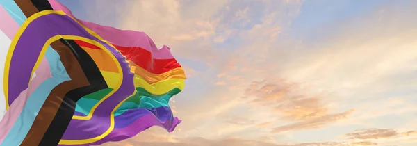 LGBTQ Ayrıcalıklı İlerici Gurur bayrağı bulutlu gökyüzünde rüzgarda dalgalanıyor. Özgürlük ve aşk kavramı. Gurur ayı. Eylemcilik, toplum ve özgürlük kavramı. Uzayı kopyala 3d illüstrasyon.