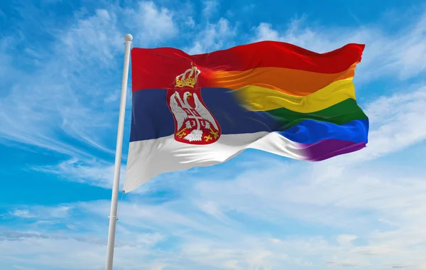 Bandeira Nacional Lgbt Sérvia Bandeira Acenando Vento Céu Nublado Conceito — Fotografia de Stock