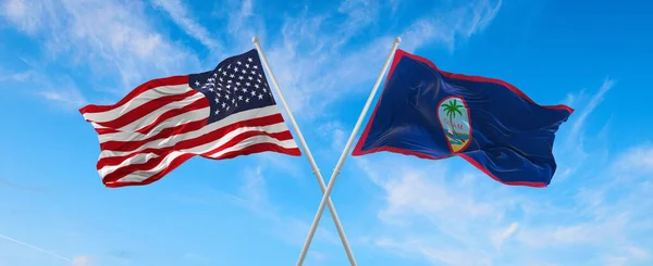 Два Флага Сша Штата Гуам Машущих Ветром Флагштоках Против Неба — стоковое фото