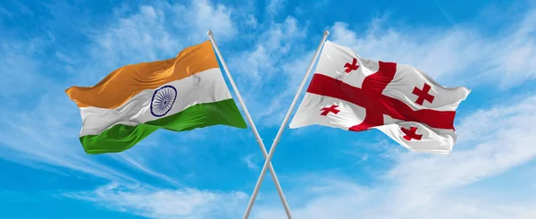 Překročil Národní Vlajky Indie Gruzie Vlajka Vlnící Větru Zamračené Obloze — Stock fotografie