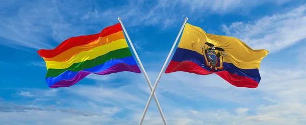 Skrzyżowane Flagi Igbt Ekwadoru Machające Wietrze Zachmurzonym Niebie Wolność Miłość — Zdjęcie stockowe