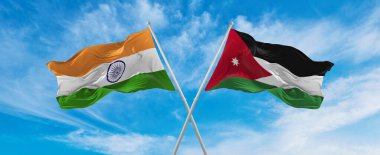 Hindistan ve Ürdün bayraklarını aştı bulutlu gökyüzünde rüzgarda dalgalanan bayrak. İlişkiyi, diyaloğu, iki ülke arasında seyahat etmeyi sembolize ediyor. Boşluğu kopyala